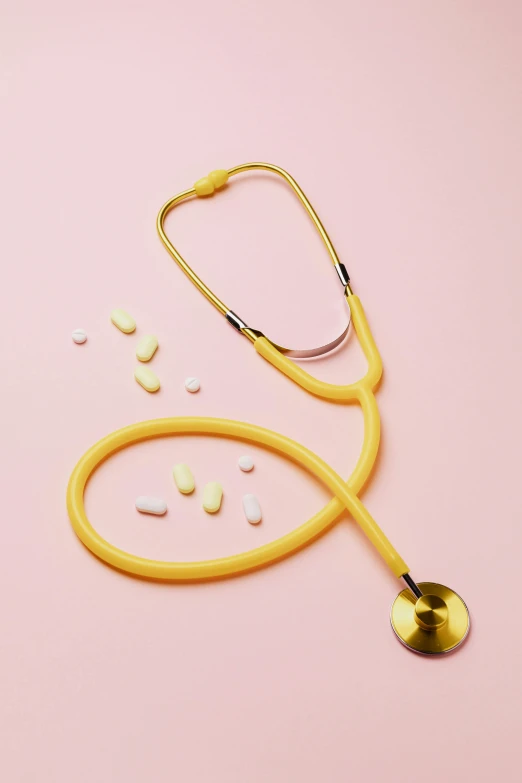 a stethoscope and pills on a pink background, by Gavin Hamilton, story, yellow colors, cast, instagram photo