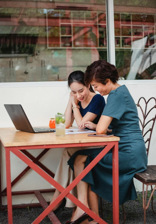 two women sitting at a table with a laptop, by Reuben Tam, pexels contest winner, square, 15081959 21121991 01012000 4k, mai anh tran, customer