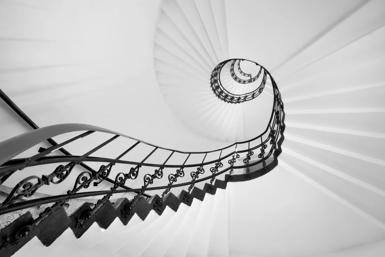 a black and white photo of a spiral staircase, by Matthias Weischer, unsplash contest winner, baroque, penned with black on white, light of infinity, spire, panzer