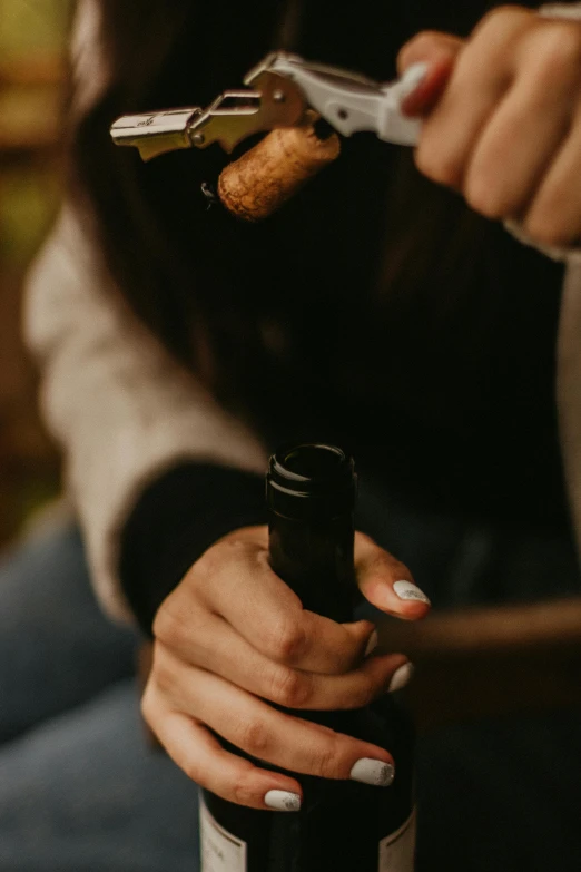 a woman opening a bottle of wine with a pair of scissors, pexels contest winner, visual art, eating a mushroom, maple syrup highlights, black, high quality product image”