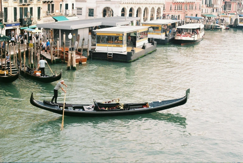 a man riding a gondola on top of a river, inspired by Quirizio di Giovanni da Murano, pexels contest winner, kodak portra film, harbour, jenny seville, youtube thumbnail