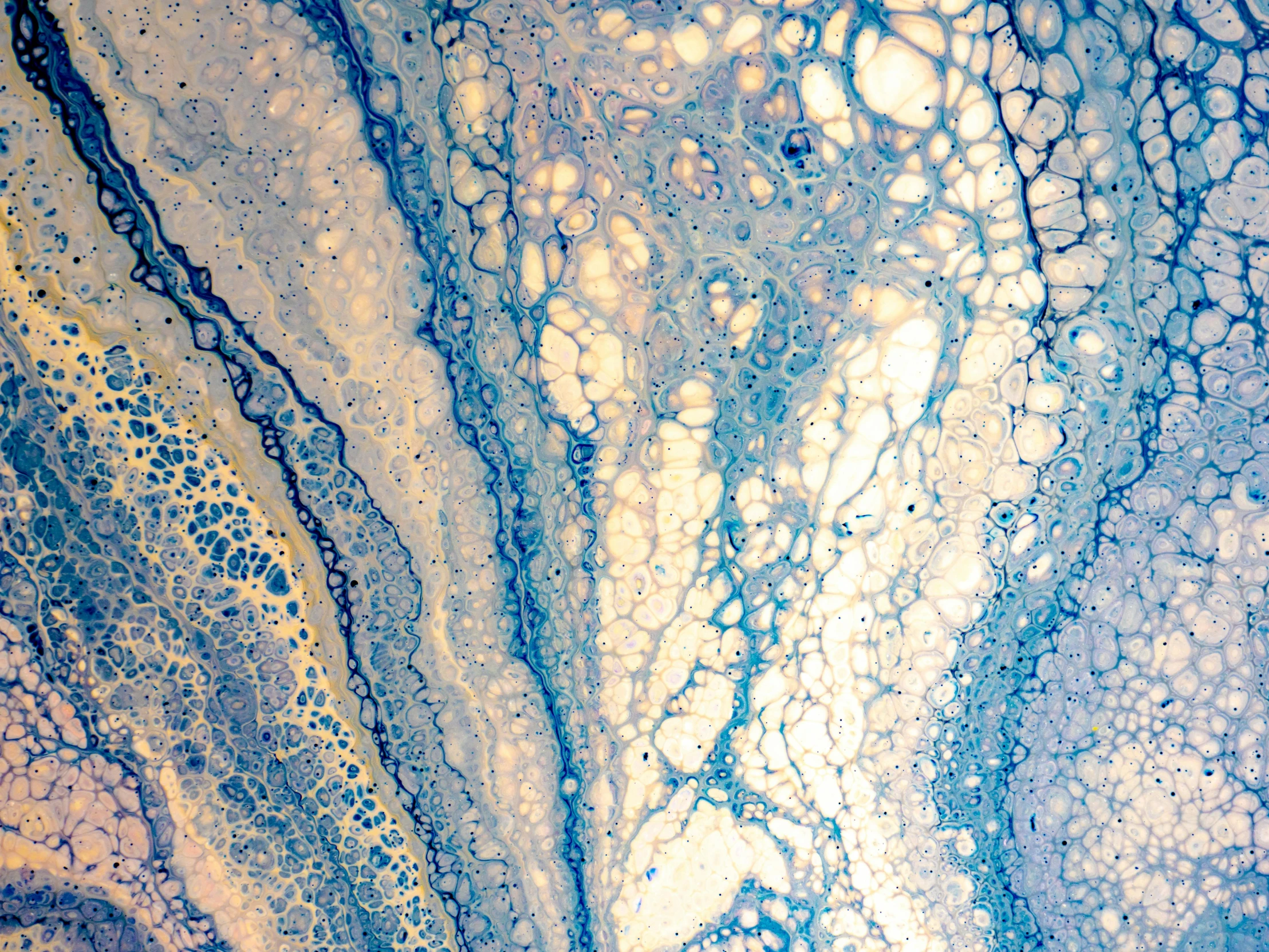 a close up of a blue and white painting, by Leticia Gillett, metaphysical painting, acrylic pouring, ariel view, iridescent soapy bubbles, album cover