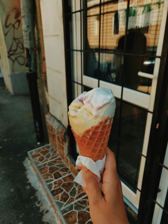 a person holding an ice cream cone in their hand, 💋 💄 👠 👗, buenos aires, multiple stories, profile image