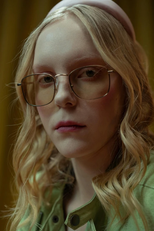 a close up of a person wearing glasses, by Lee Gatch, renaissance, ellie bamber, professionally color graded, gold framed, sydney sweeney