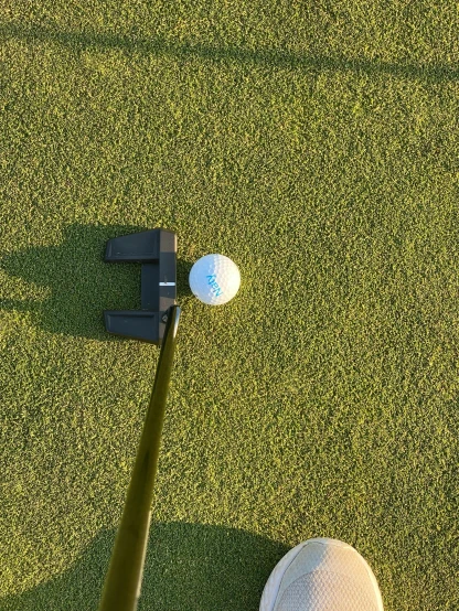 a person taking a swing at a golf ball, looking down from above, screensaver, cleanest image