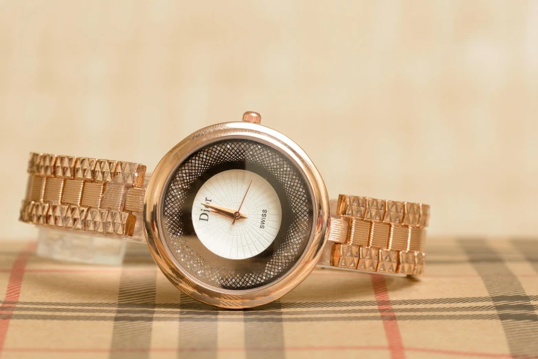 a close up of a watch on a table, a portrait, by Dan Content, trending on pixabay, dior, gradient brown to white, thumbnail, shimmer detailed