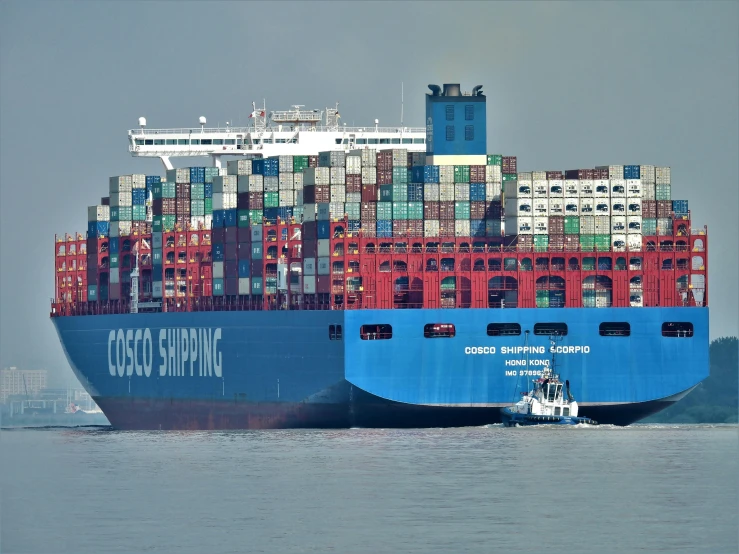 a large container ship on a body of water, cecco bravo, 🦩🪐🐞👩🏻🦳, closeup photograph, cosmopolitan