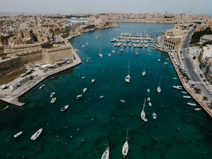 a large body of water filled with lots of boats, pexels contest winner, hurufiyya, fan favorite, harbour, drone footage, from of thrones