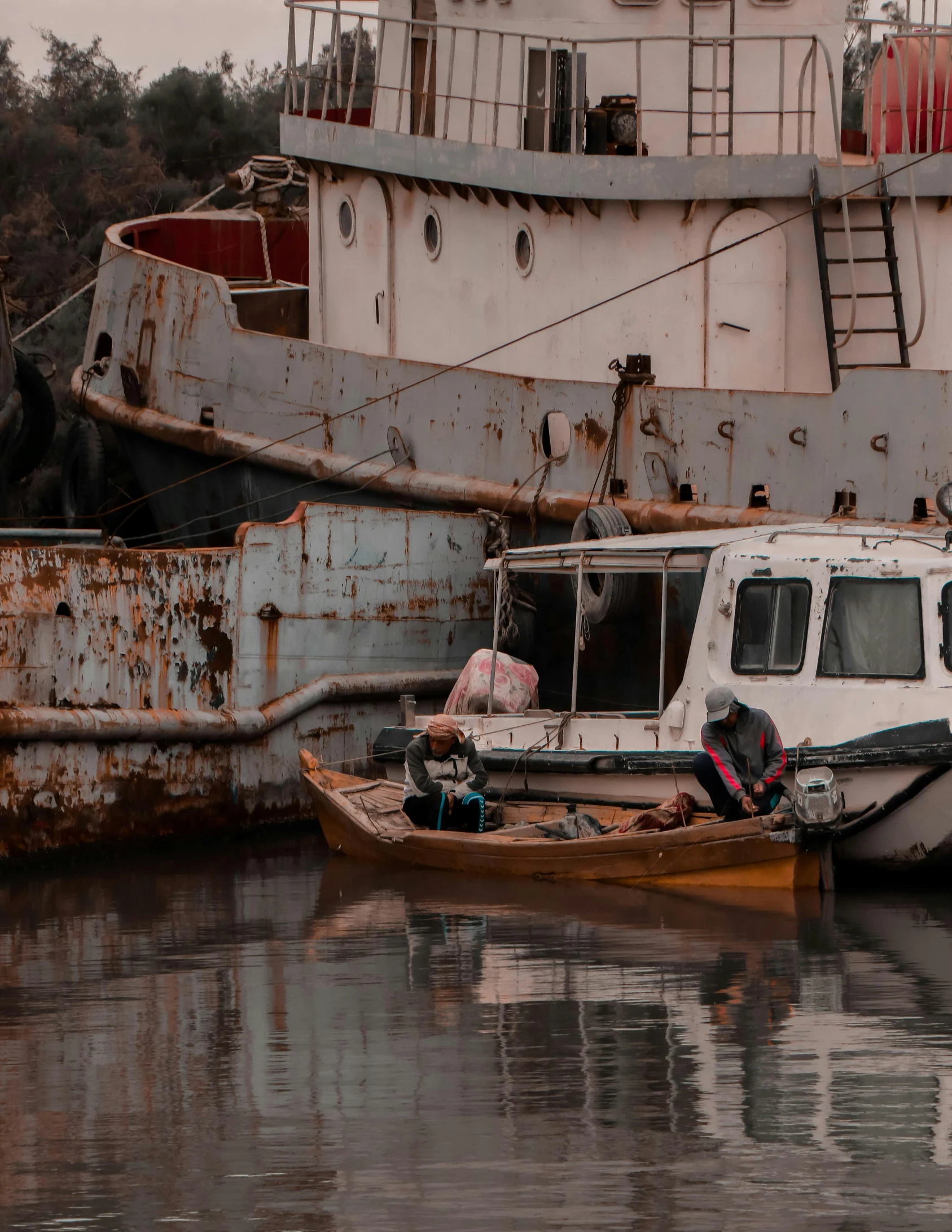 a couple of boats that are sitting in the water, pexels contest winner, portrait of a slightly rusty, thumbnail, multiple stories, faded glow