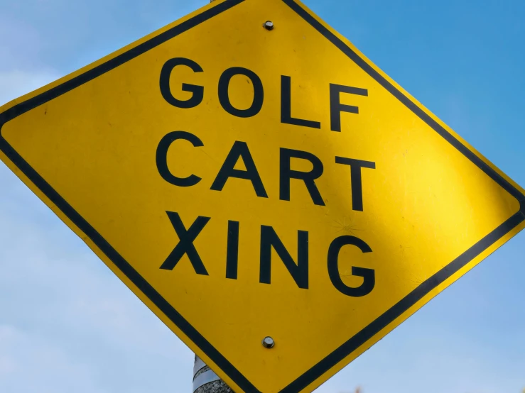 a yellow street sign that says golf cart xing, by Michael Goldberg, square, getty images, avatar image, agonizing