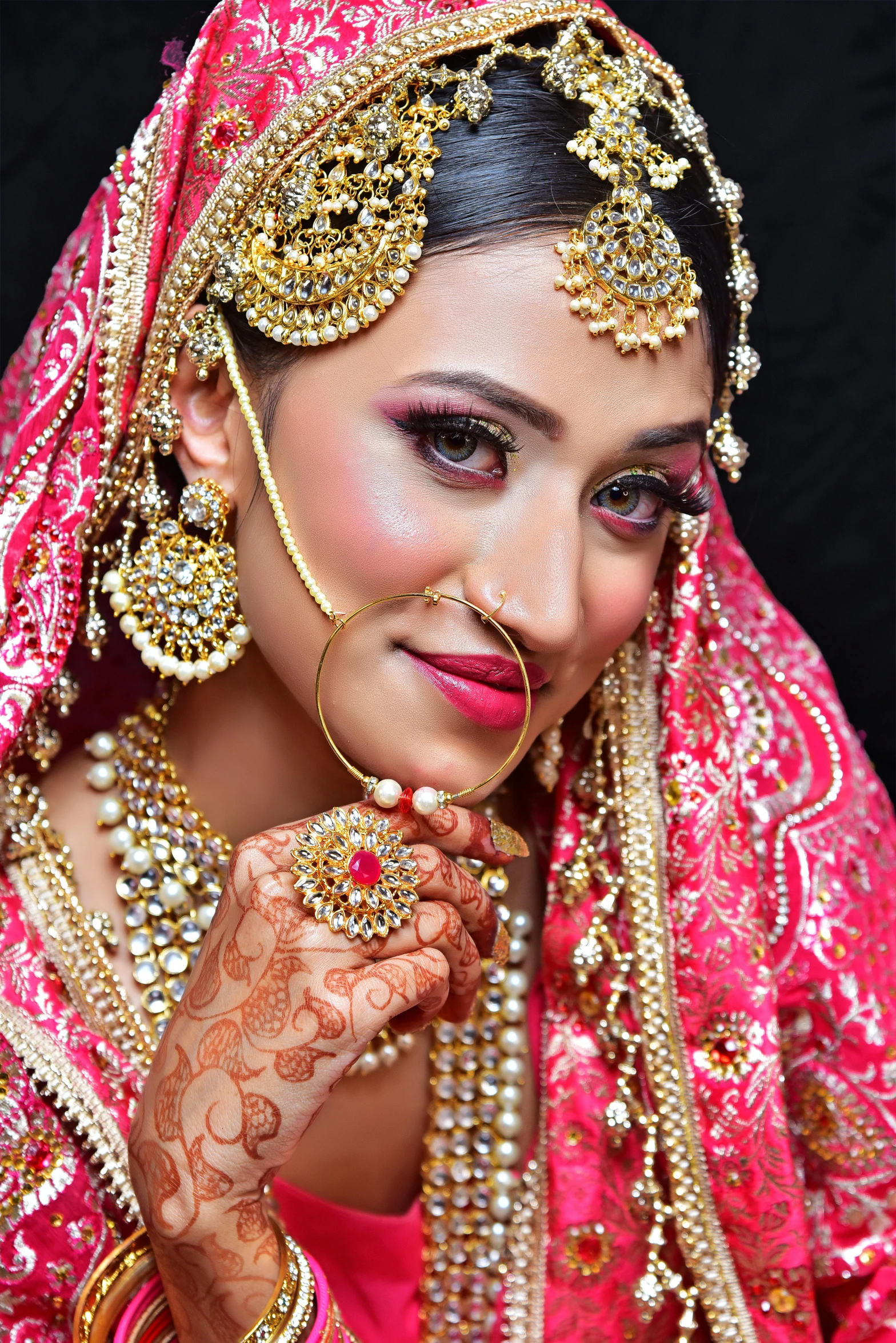 a beautiful indian bride posing for the camera, a portrait, pixabay, renaissance, ring flash closeup photograph, thumbnail, pink, uploaded