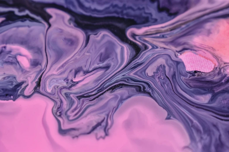 a close up of a liquid painting on a surface, inspired by Yanjun Cheng, trending on pexels, generative art, purple and pink, abstract claymation, marbling, album