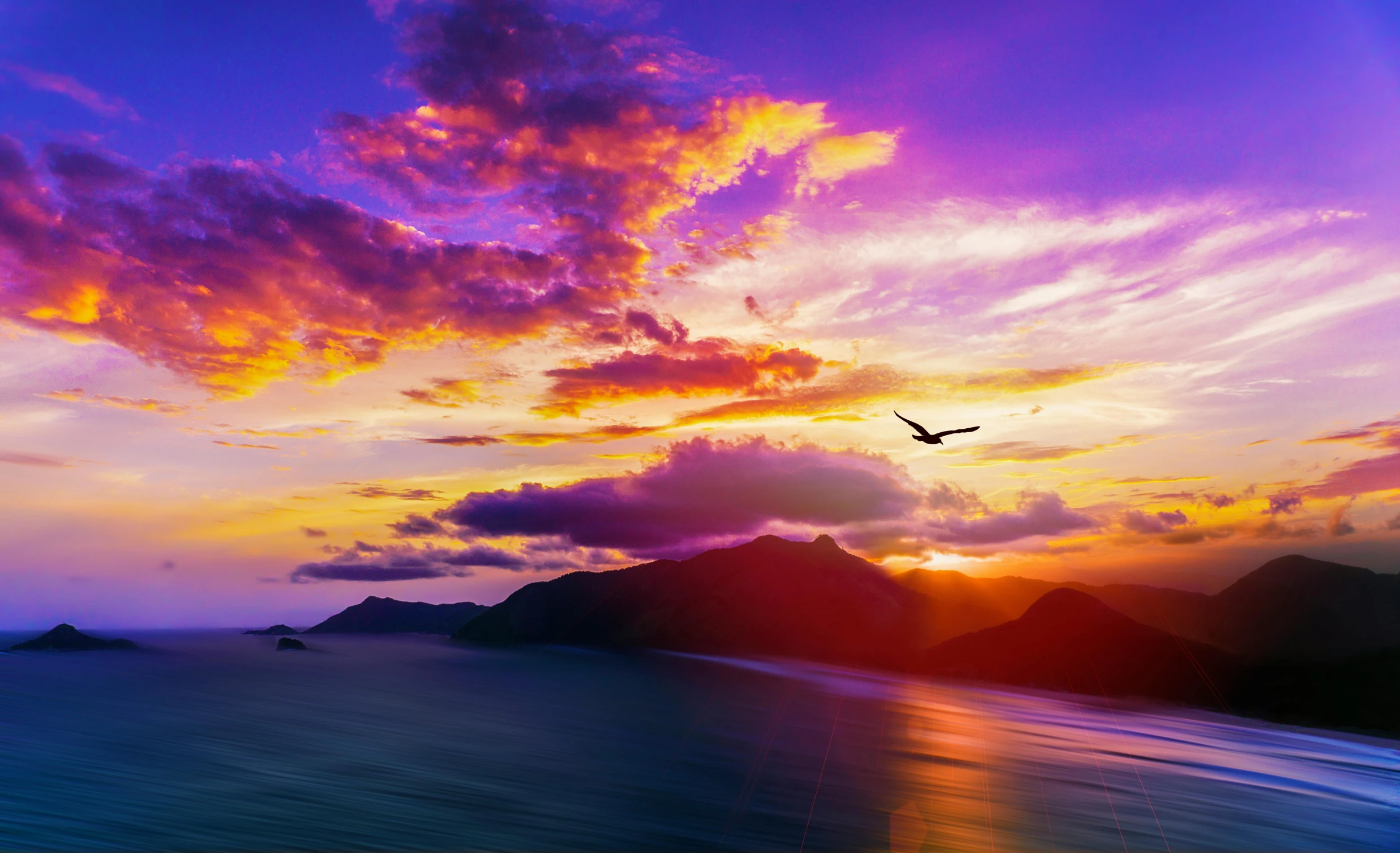 a bird flying over a body of water at sunset, an album cover, pexels contest winner, romanticism, vibrant triadic color scheme, mountains and ocean, violet sky, multicolored