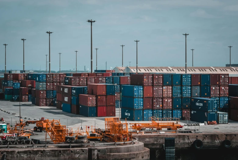 a lot of shipping containers sitting on top of a dock, pexels contest winner, avatar image, fan favorite, high quality image, video