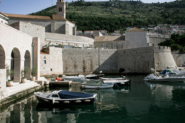 a number of boats in a body of water near a building, pexels contest winner, renaissance, hydra, john pawson, square, thumbnail