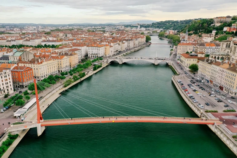 an aerial view of a bridge over a river, pexels contest winner, viridian and venetian red, arkane lyon, square, panoramic