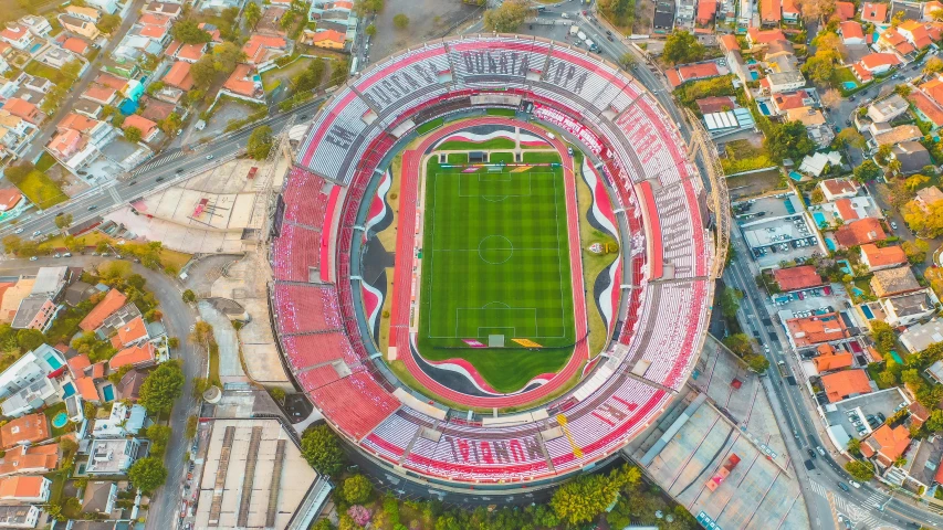 an aerial view of a soccer stadium, a digital rendering, by Daniel Lieske, pexels contest winner, guanajuato, 💋 💄 👠 👗, giant aztec spaceship, cover shot