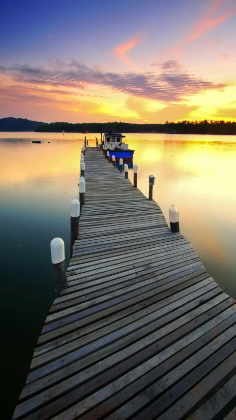 a dock that is next to a body of water, an album cover, inspired by Jan Kupecký, pexels contest winner, hurufiyya, new hampshire, sun set, hangzhou, today\'s featured photograph 4k