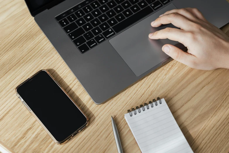 a laptop computer sitting on top of a wooden desk, trending on pexels, writing on a clipboard, rounded lines, thumbnail, it specialist