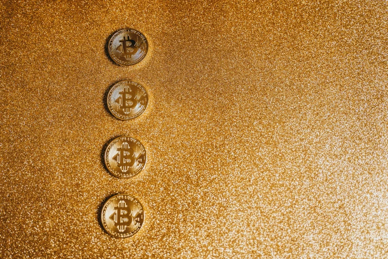 a number of bitcoins on a shiny surface, by Lena Alexander, renaissance, gold flake, 1024x1024, gold decorations, view from the bottom