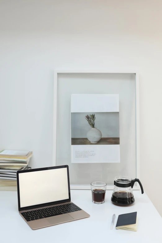 a laptop computer sitting on top of a white desk, a poster, by Harvey Quaytman, portrait of morning coffee, herbarium page, white border frame, with clear glass