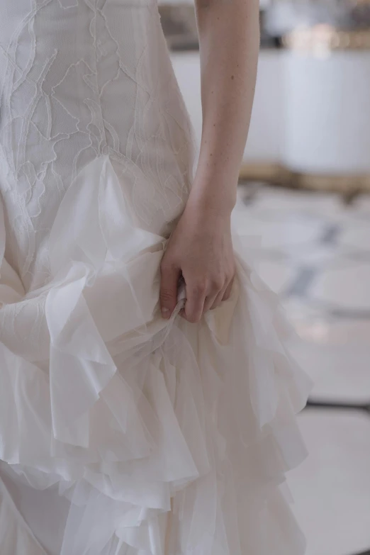 a close up of a woman in a wedding dress, inspired by Liu Haisu, unsplash, folds of fabric, full - length view, b - roll, ( ( theatrical ) )