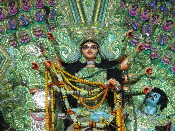 a close up of a statue of a woman, by Meredith Dillman, samikshavad, elaborately costumed, kali, in the center of the image, -