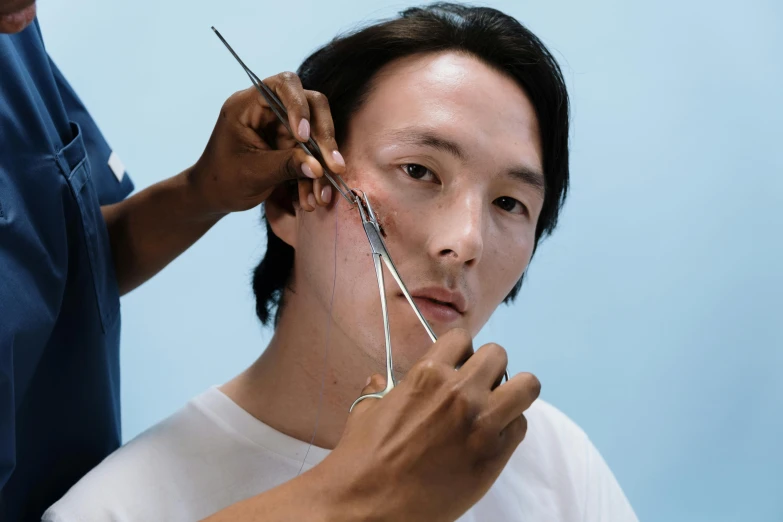 a man cutting another man's hair with scissors, inspired by Fei Danxu, trending on pexels, hyperrealism, jimin\'s right eyelid swollen, square facial structure, david choe, sangsoo jeong