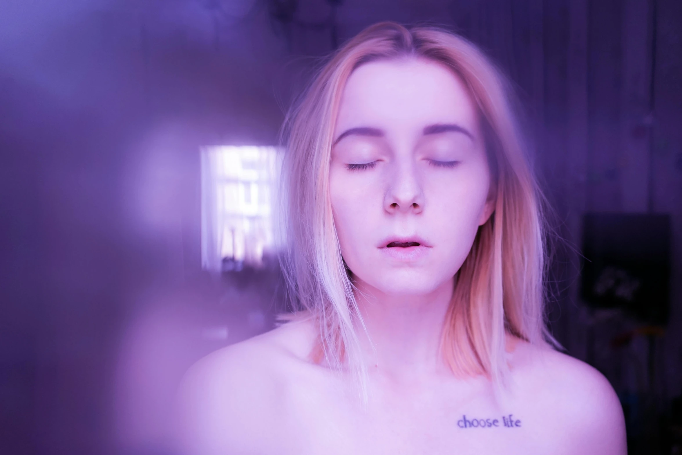 a woman with a tattoo on her chest, an album cover, inspired by Elsa Bleda, trending on pexels, aestheticism, brightly lit purple room, saoirse ronan, dreaming face, chloe grace moretz