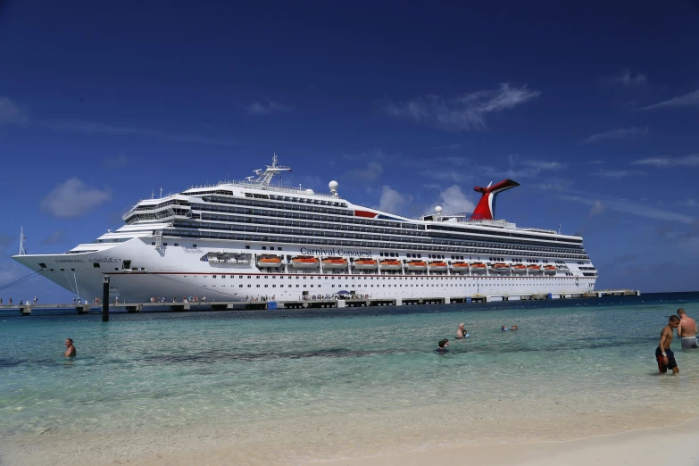 a cruise ship is docked at the beach, by Carey Morris, pexels contest winner, renaissance, avatar image, carnival, profile picture, clean photo