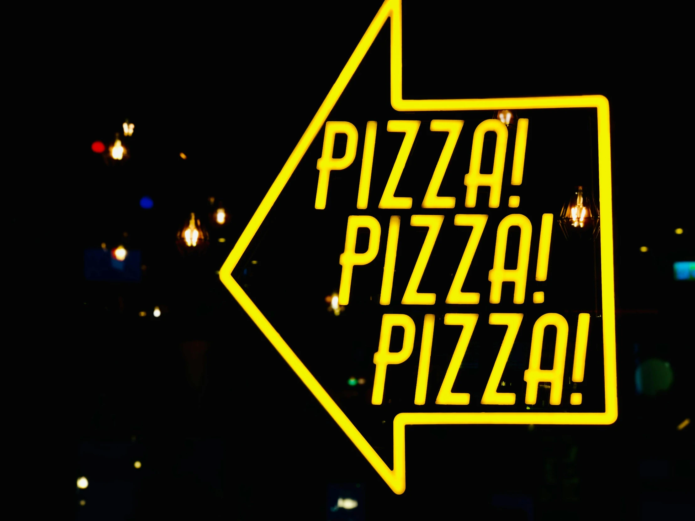 a neon sign that says pizza pizza, by Julia Pishtar, fan favorite, concert photo, yellow, food