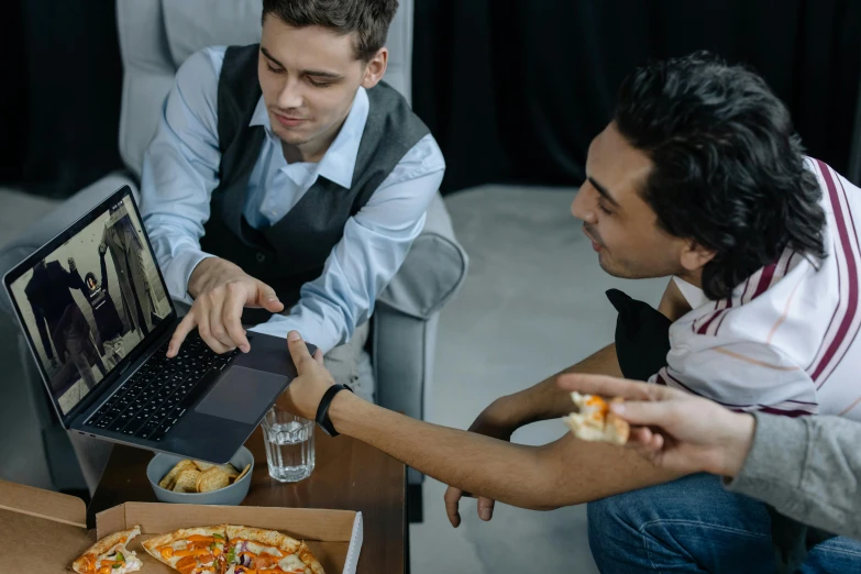 a couple of men sitting next to each other on a couch, pexels contest winner, renaissance, serving fries, people at work, eating pizza, avatar image