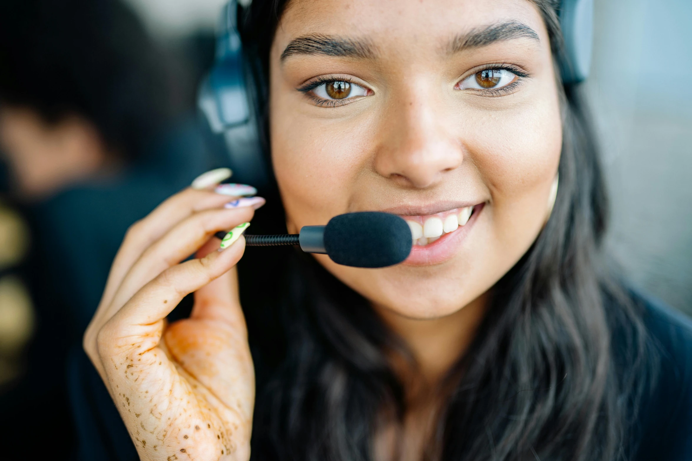 a close up of a person wearing a headset, pexels contest winner, hurufiyya, manuka, taking control while smiling, thumbnail, pilot girl