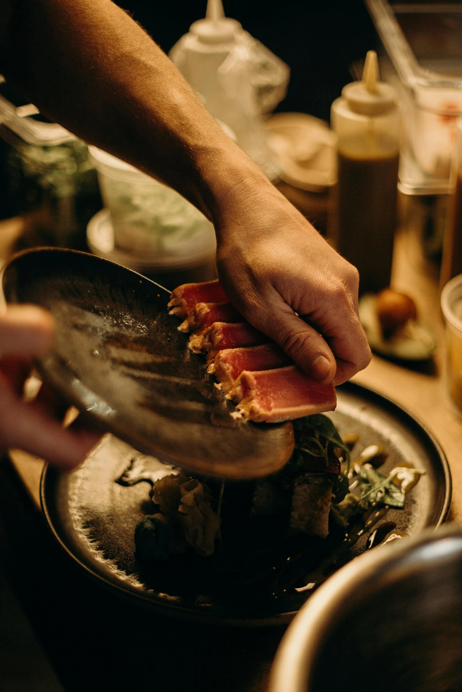 a person holding a spoon over a plate of food, sake, floating embers, thumbnail, plating