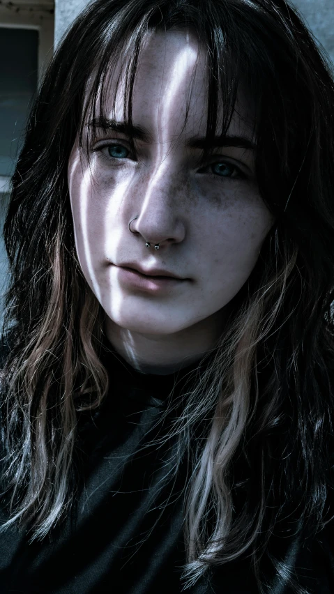 a close up of a person with long hair, a character portrait, inspired by Elsa Bleda, pexels contest winner, ellie (last of us), grungy gothic, video game avatar, white freckles