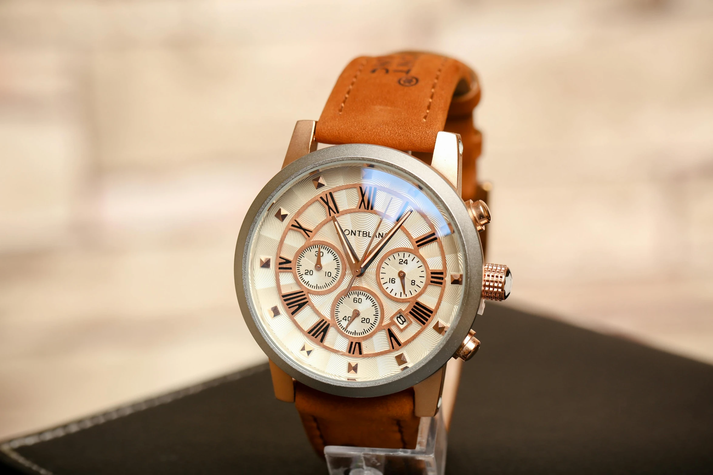 a close up of a watch on a table, light brown colors, conan, river island, youtube thumbnail