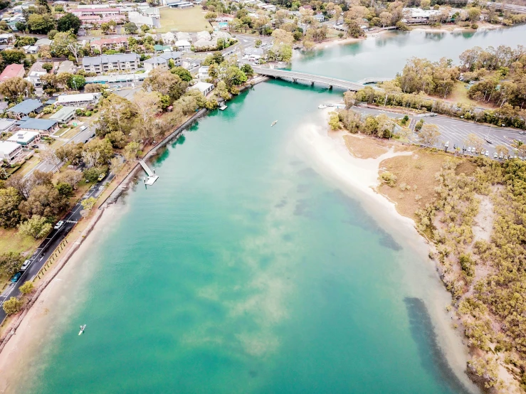 an aerial view of a large body of water, by Lee Loughridge, pexels contest winner, hurufiyya, manly, thumbnail, lakeside, thomas kinkad