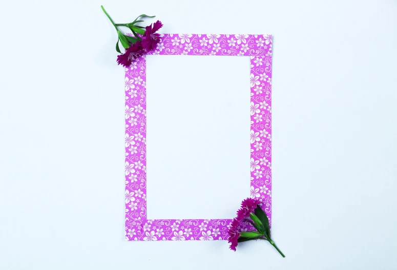a purple flower sitting on top of a white surface, a picture, frame around picture, item, thumbnail, decorated with flowers