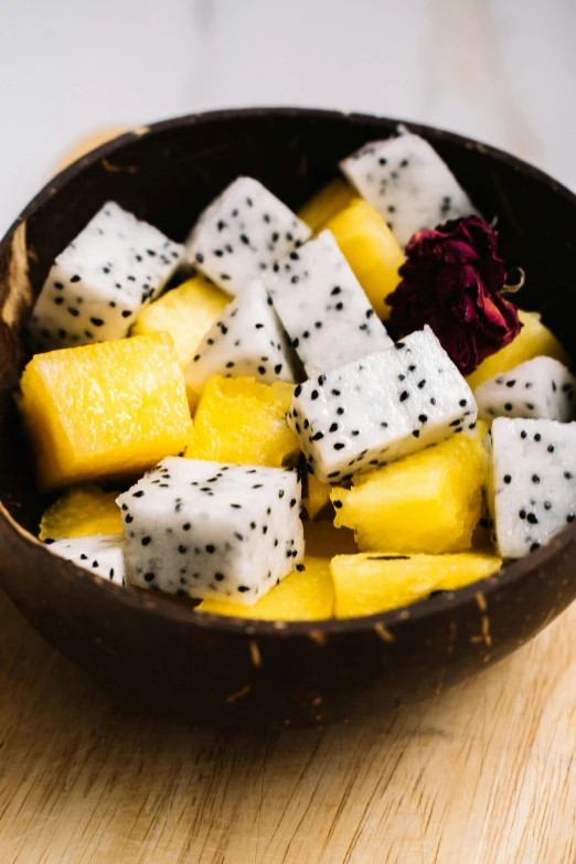 a close up of a bowl of fruit on a table, dragon fruits, thumbnail, cheesy, square