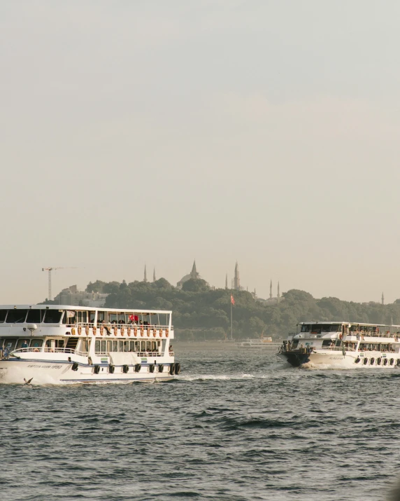 a couple of boats that are in the water, pexels contest winner, hurufiyya, the fall of constantinople, non-binary, thumbnail, actual photo