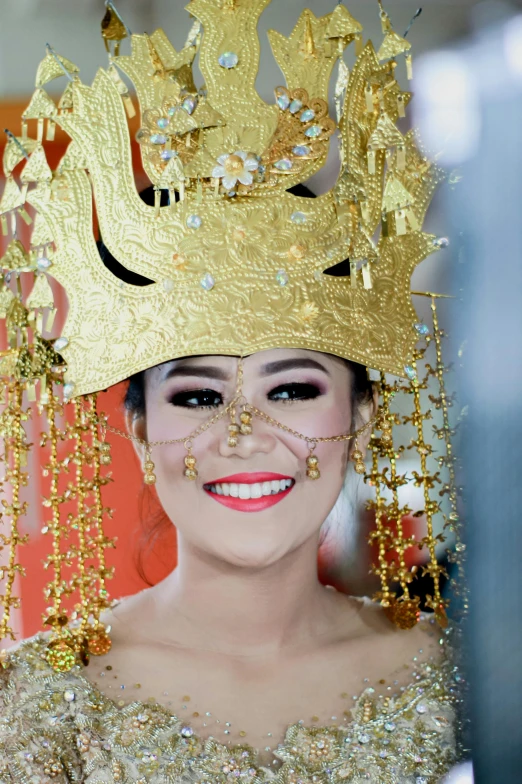 a woman with a golden crown on her head, pexels contest winner, sumatraism, very slightly smiling, square, bride, slide show