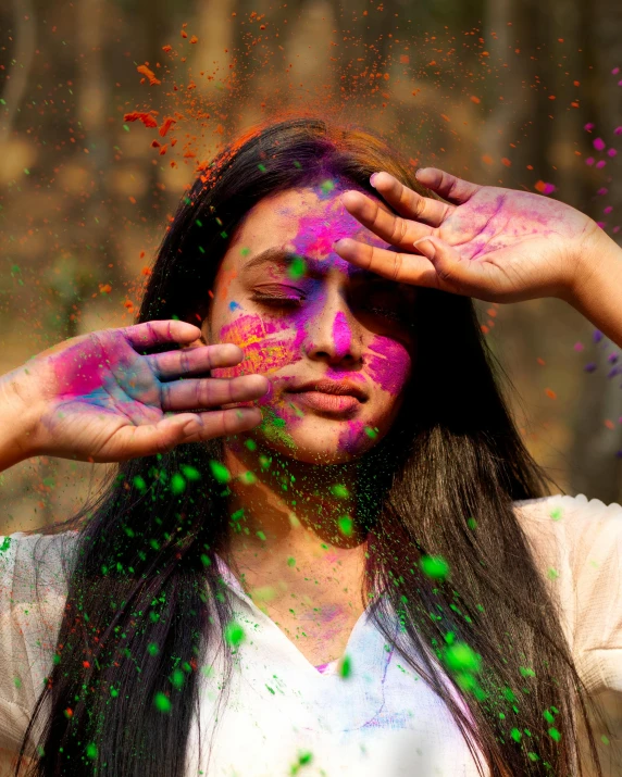 a woman covering her eyes with colored powder, a colorized photo, trending on unsplash, provocative indian, colorful]”, lgbt, colorful”