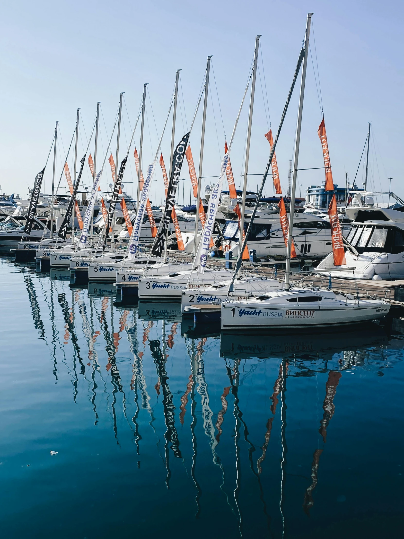 a bunch of boats that are sitting in the water, sailboats in the water, profile image, oktane, at the waterside