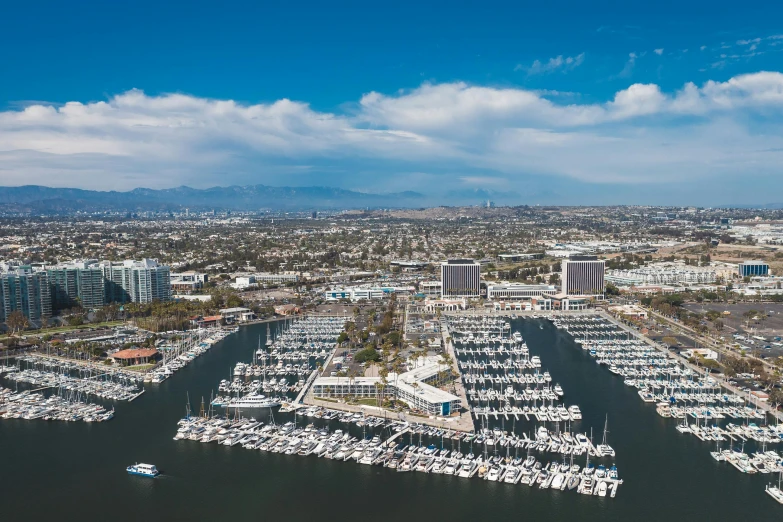 a harbor filled with lots of boats next to tall buildings, 1600 south azusa avenue, drone photograpghy, thumbnail, ready to model