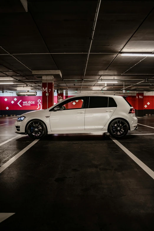 a white car parked in a parking garage, pexels contest winner, wrx golf, full height, super high resolution, square