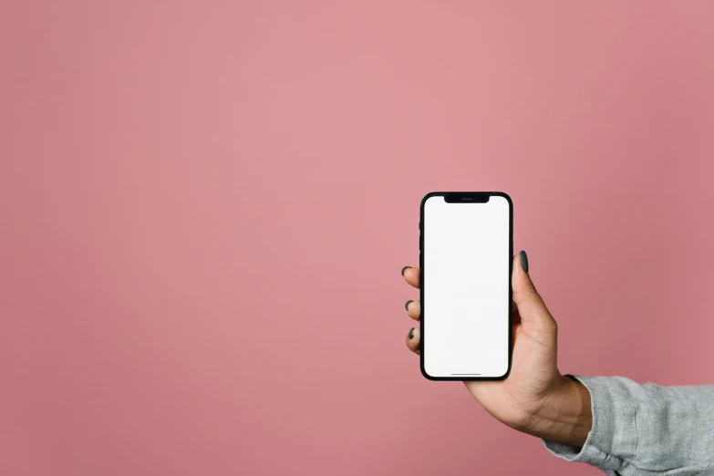 a person holding up an iphone with a white screen, by Carey Morris, minimalism, pink, square, high resolution, minimalist wallpaper