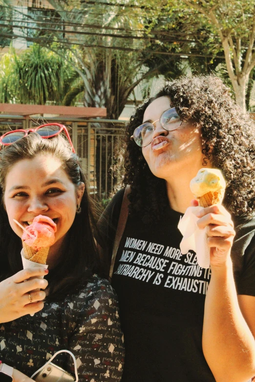 a couple of women standing next to each other, eating ice cream, calarts, hispanic, 💣 💥💣 💥