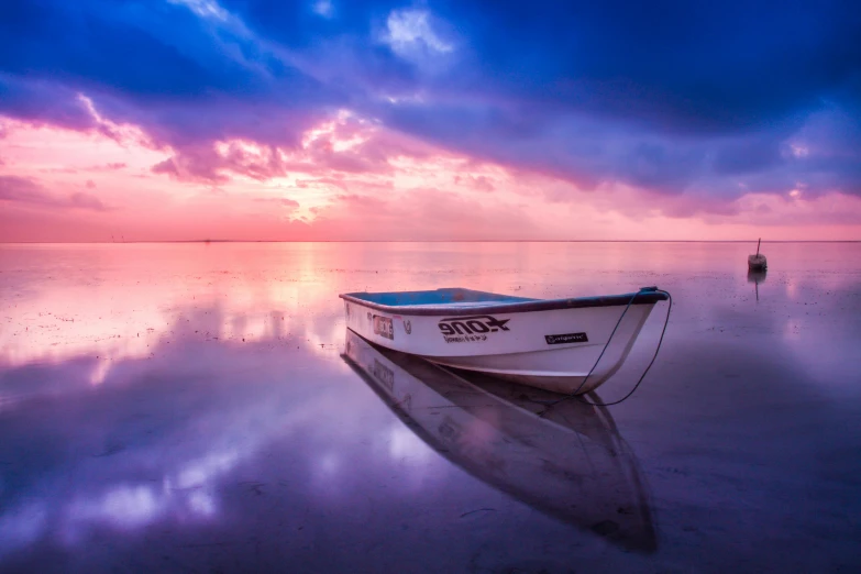 a boat sitting on top of a body of water, pexels contest winner, romanticism, pastel sky, glossy surface, tone mapping, vivid colour