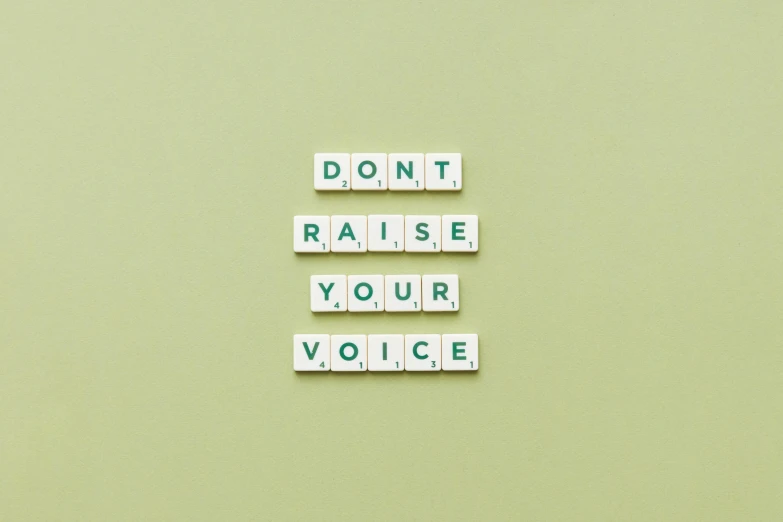 the words don't raise your voice spelled in scrabbles, trending on unsplash, renaissance, quotev, #green, nursing, vibration
