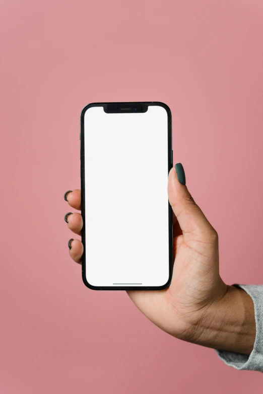 a hand holding a phone with a white screen mock mock mock mock mock mock mock mock mock mock mock mock mock mock mock mock mock mock mock, by Carey Morris, trending on pexels, pink background, ebony skin, shot on iphone 1 3 pro max, halfbody headshot